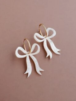 Wolf & Moon Bow Hoops In Cream -Wolf & Moon bow hoops cream lifestyle 1