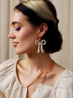 Wolf & Moon Bow Hoops In Cream -Wolf & Moon bow hoops cream model 1