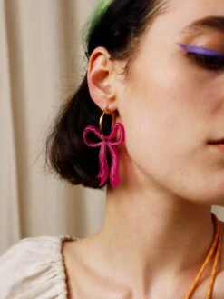 Wolf & Moon Bow Hoops In Magenta -Wolf & Moon bow hoops magenta model 2
