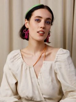 Wolf & Moon Bow Hoops In Magenta -Wolf & Moon bow hoops magenta model 3