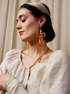 Wolf & Moon Bow Statement Hoops In Cream -Wolf & Moon bow statement hoops apricot model 3 c926210b a15b 4b12 a3cf ec418d3b6731