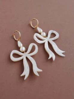 Wolf & Moon Bow Statement Hoops In Cream -Wolf & Moon bow statement hoops cream lifestyle 2