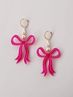 Wolf & Moon Bow Statement Hoops In Magenta -Wolf & Moon bow statement hoops magenta lifestyle 5