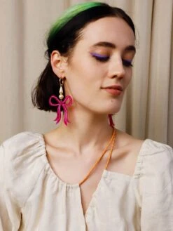 Wolf & Moon Bow Statement Hoops In Magenta -Wolf & Moon bow statement hoops magenta model 2