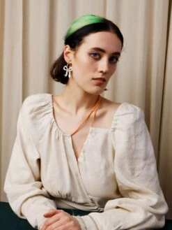 Wolf & Moon Mini Bow Hoops In Cream -Wolf & Moon mini bow hoops cream model 4