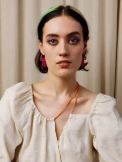 Wolf & Moon Mini Bow Hoops In Magenta -Wolf & Moon mini bow hoops magenta model 1