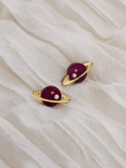 Wolf & Moon Saturn Studs In Cherry 15 Wolf & Moon Saturn Studs In Cherry -Wolf & Moon saturn studs lifestyle 2 V2