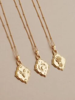 Wolf & Moon Zodiac Necklace - Gold 19 Wolf & Moon Zodiac Necklace - Gold -Wolf & Moon zodiac pendants gold lifestyle group 2